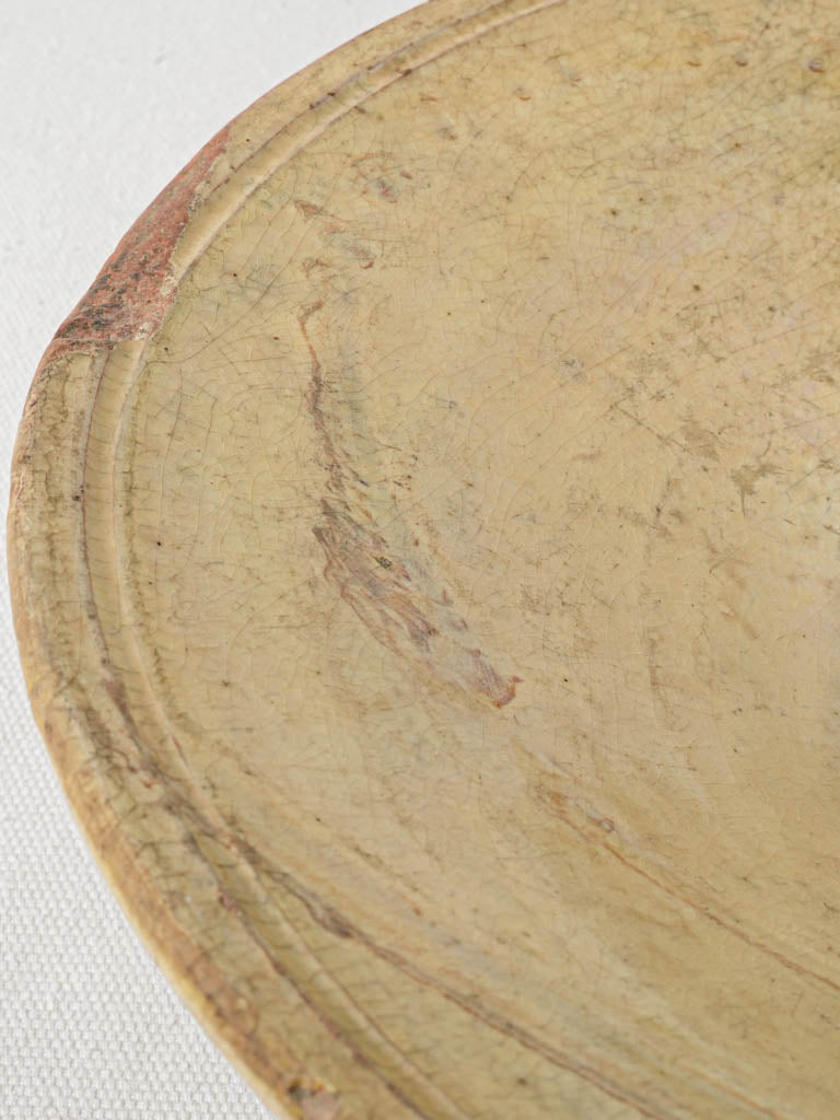 Muted, rustic ivory dish