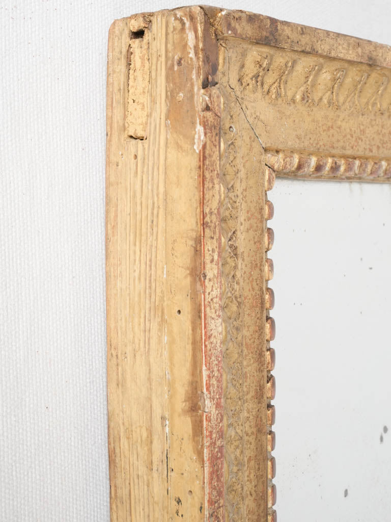 Time-worn, classic gilded mirror