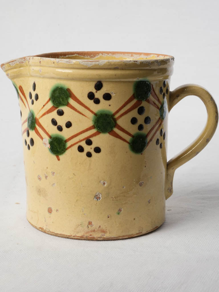 Timeworn hand pinched spout pitcher