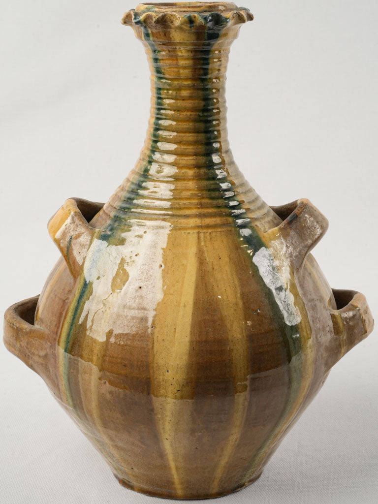 Artisanal ocher and green jar