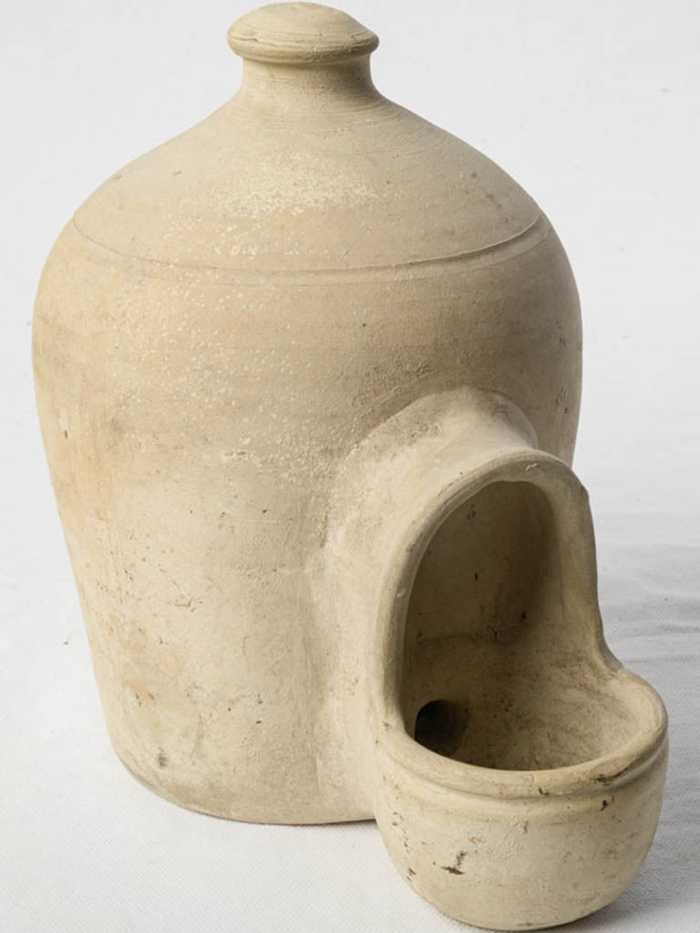 Soft chalky-hued bird waterer