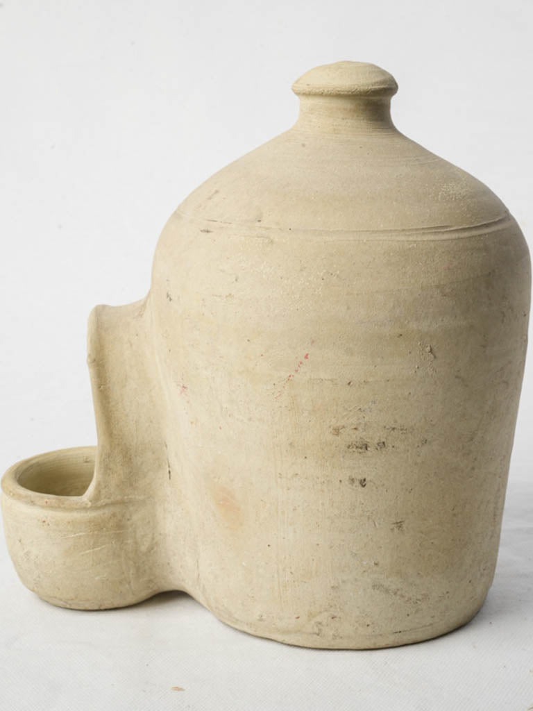 Ovoid handcrafted terracotta water feeder