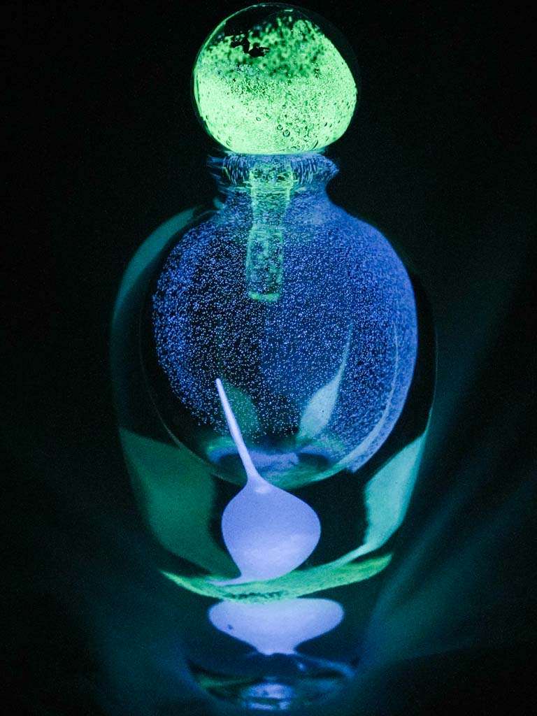 Vintage phosphorescent lidded flask