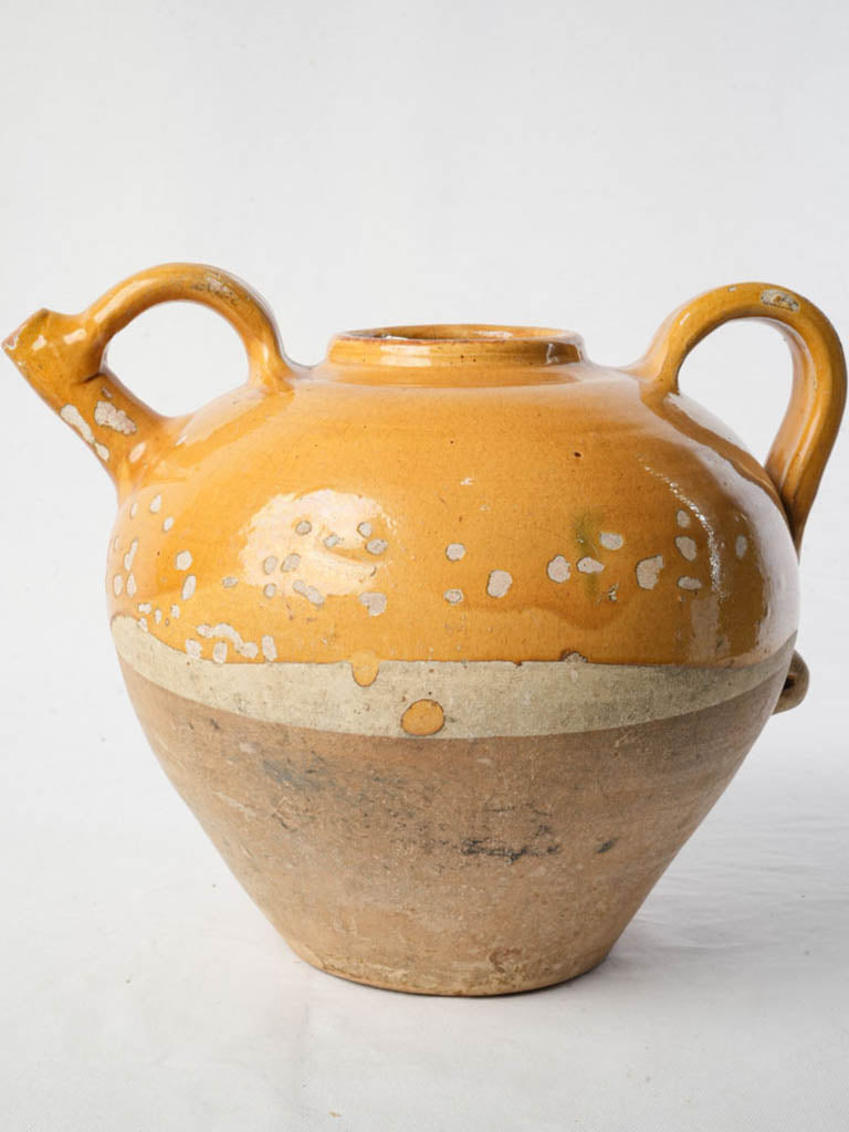 Hand-thrown earthenware decorative pitcher