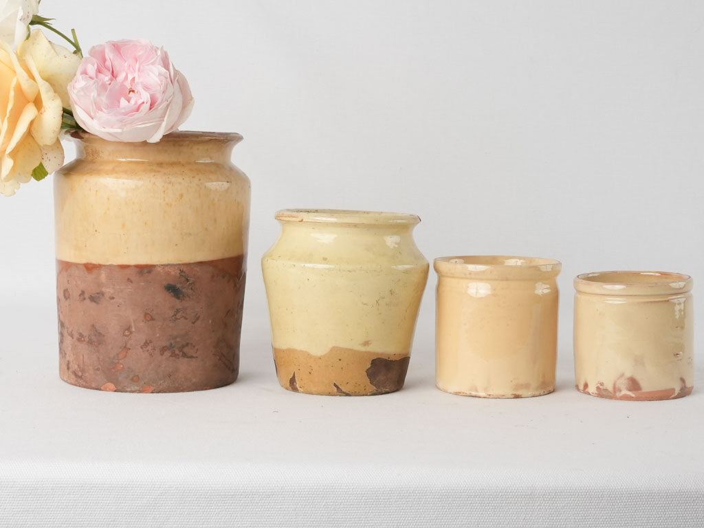 Collection of 4 preserving pots w/ yellow glaze 7½"