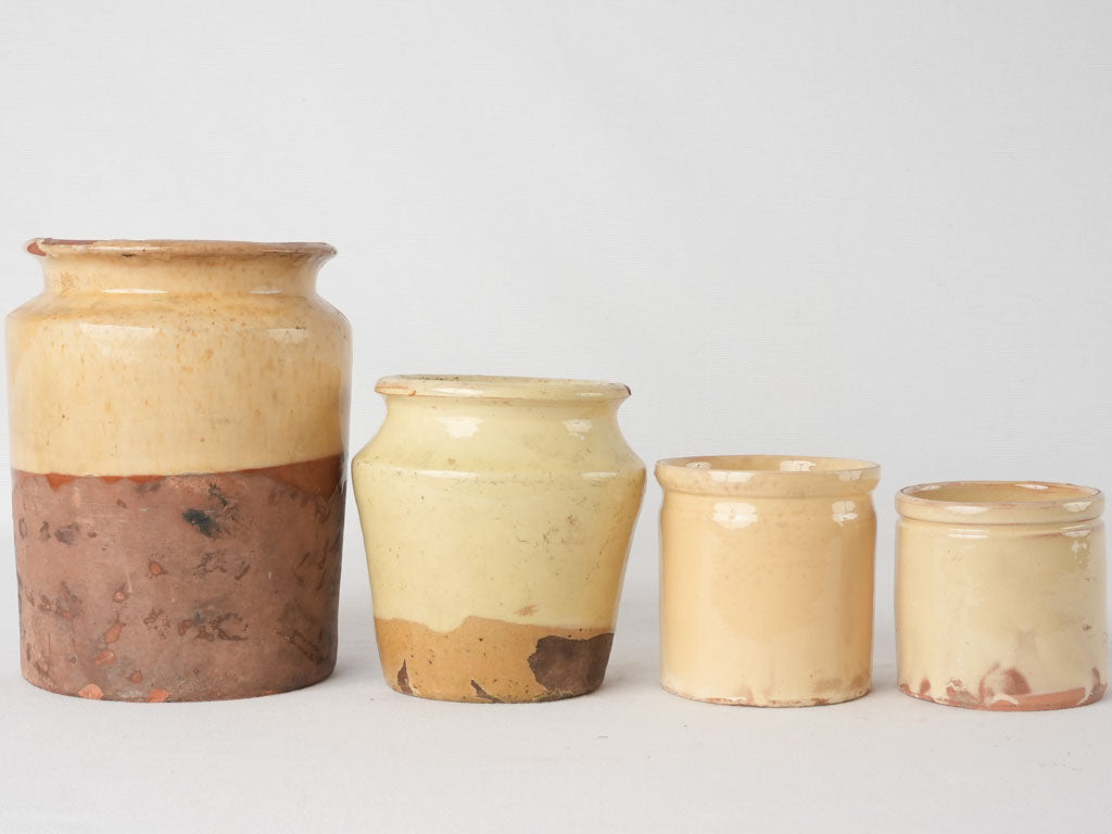Collection of 4 preserving pots w/ yellow glaze 7½"