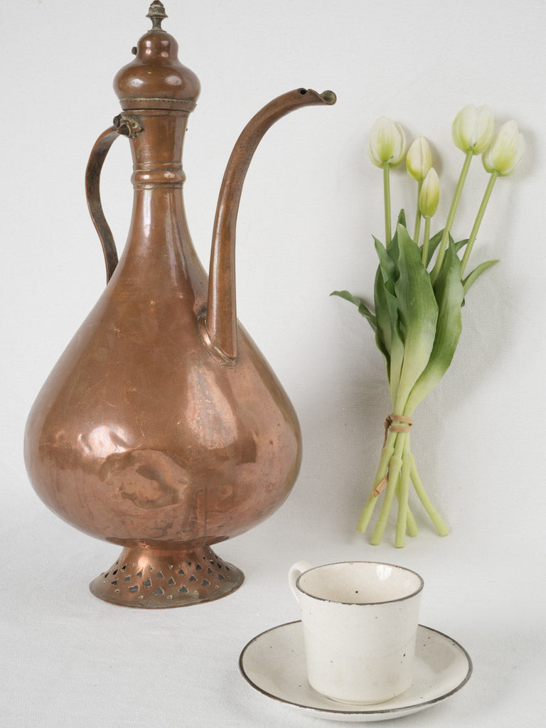 Vintage, exquisite, long-spouted oil pitcher