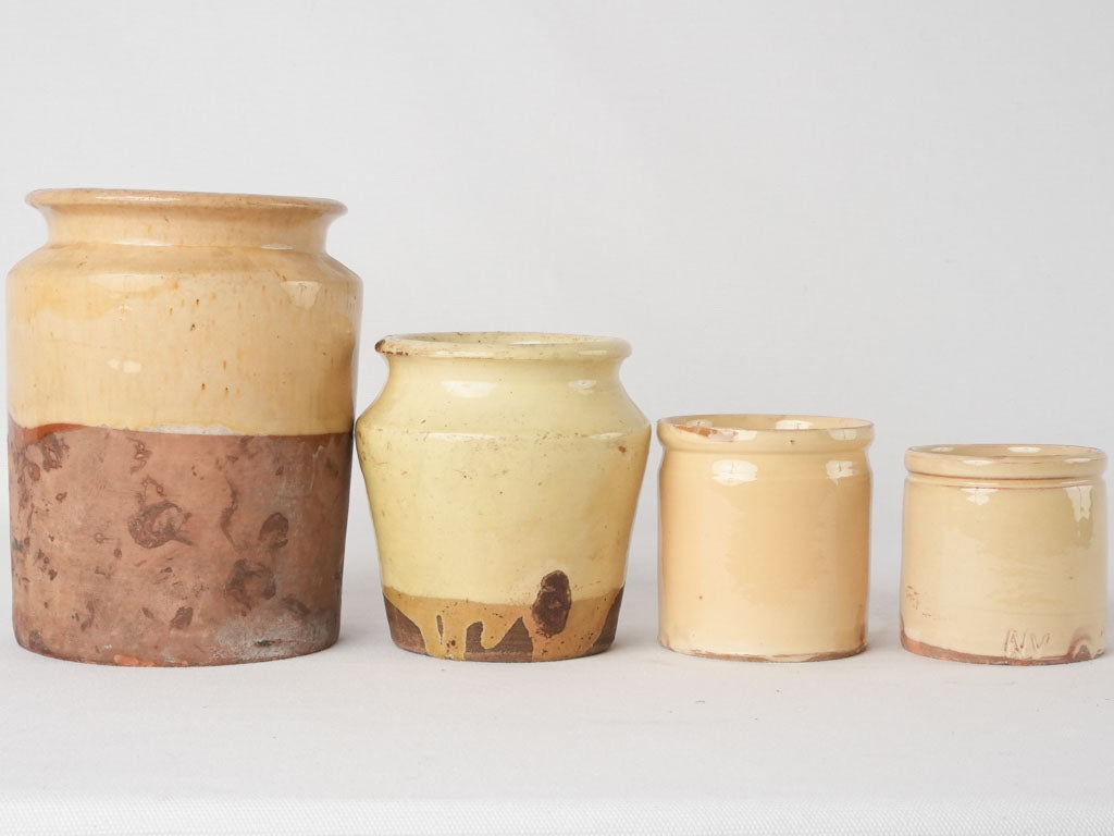 Collection of 4 preserving pots w/ yellow glaze 7½"