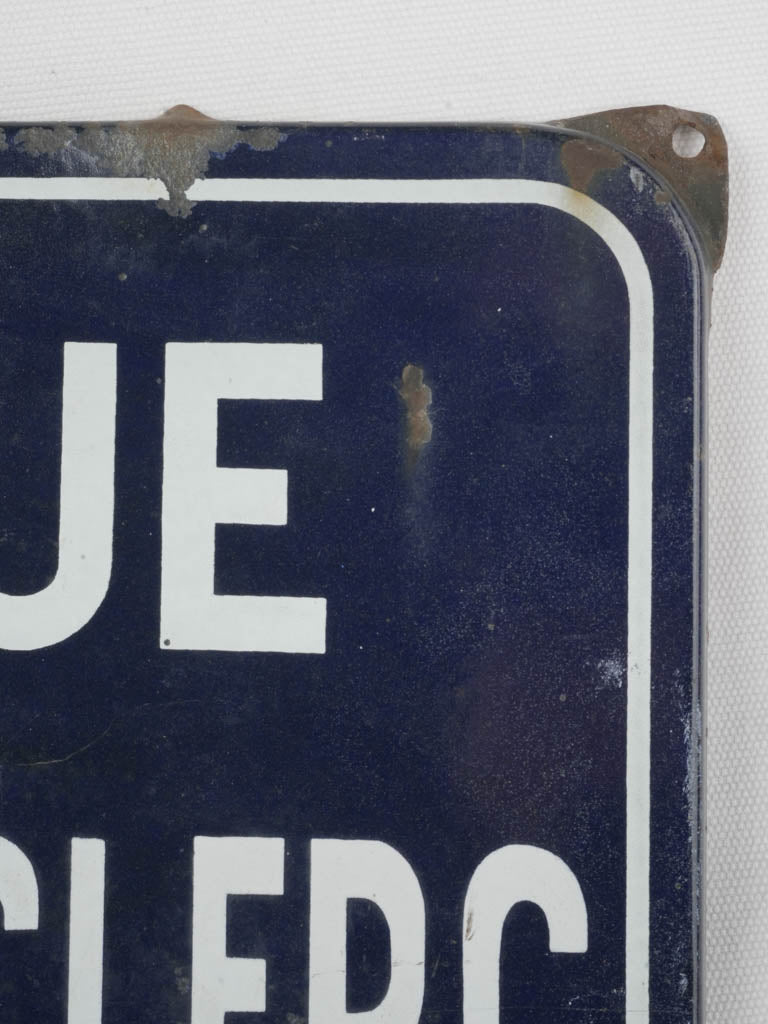 Timeworn decorative French street sign