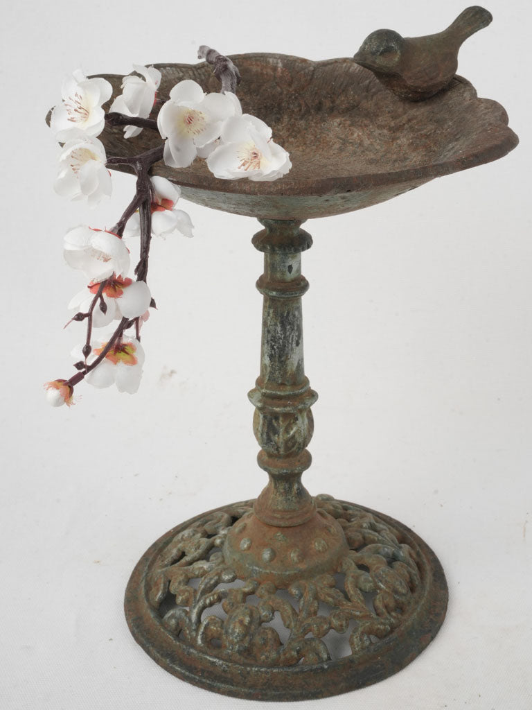 Elegant intricately designed bird bath