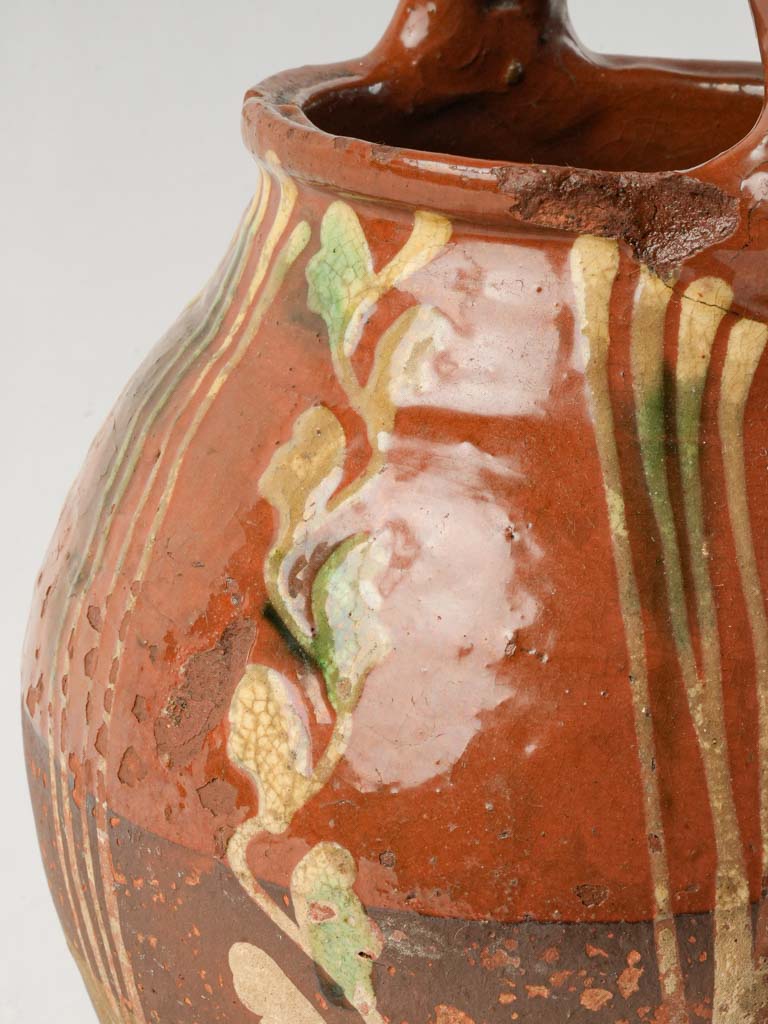 Distinctive curved spout pitcher