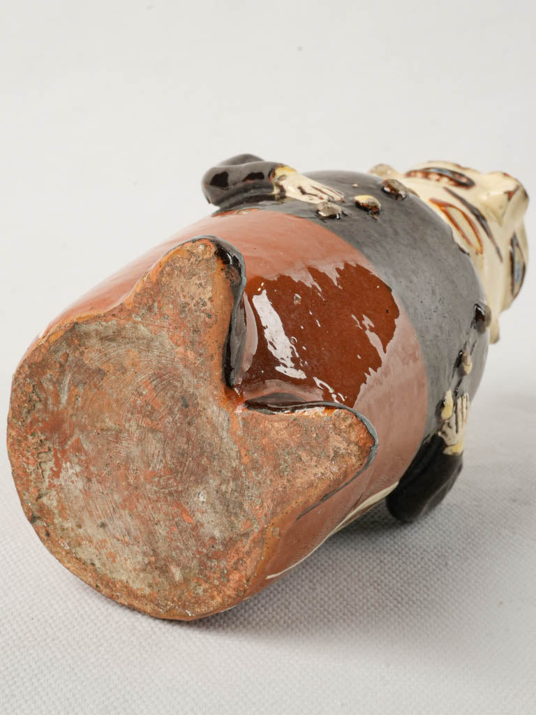 Bright terracotta gendarme-inspired vessel