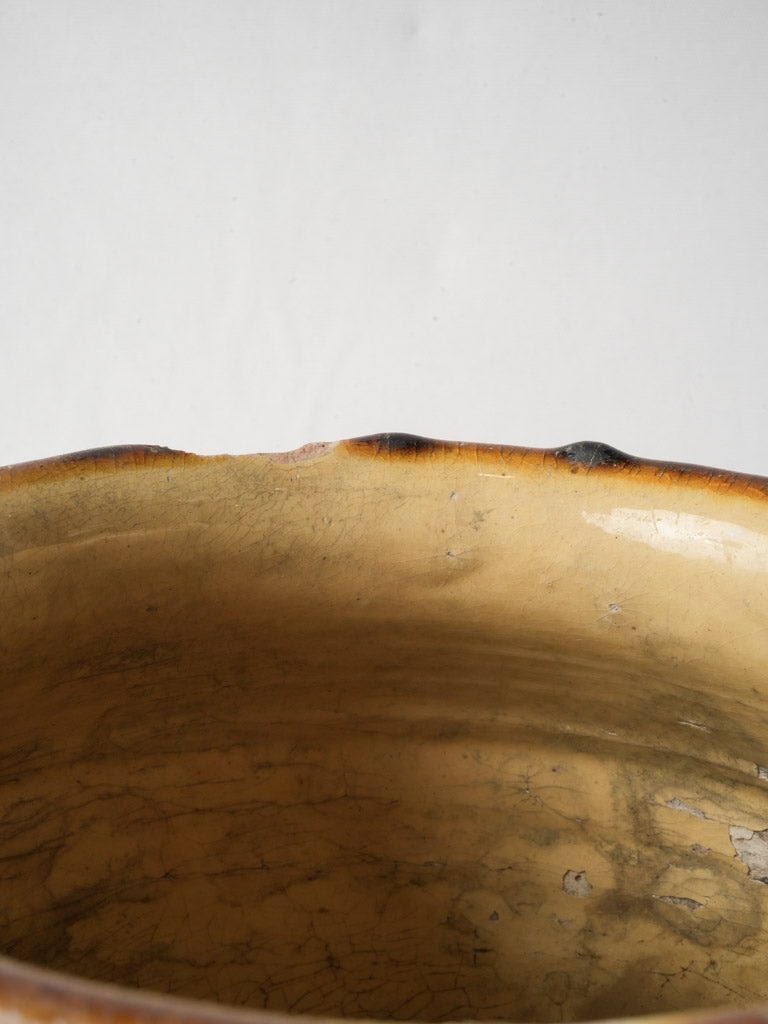 Charming imperfect mustard-glazed jar