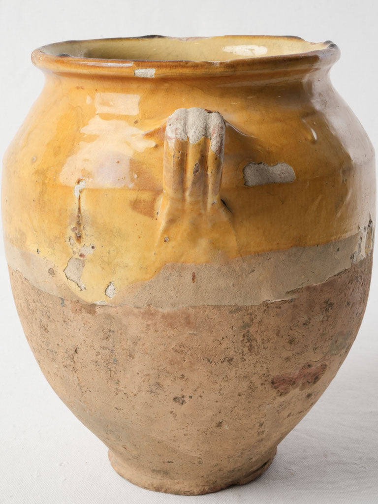 Aged chipped traditional storage pot