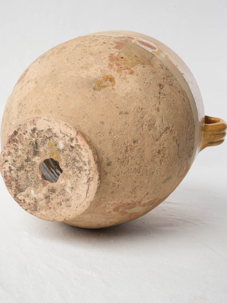 Storied earthy-toned antique vessel