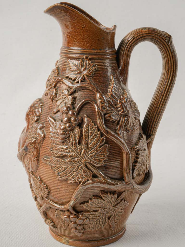Classical wooden-handled ceramic jug
