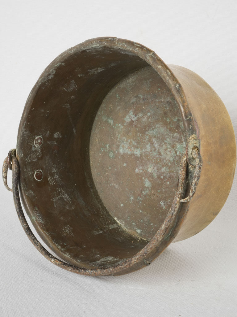 Timeless iron-handled brass cauldron