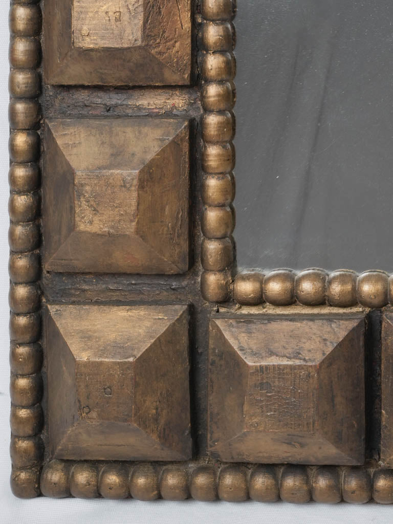 Ornate, historical, gilded rectangular mirror