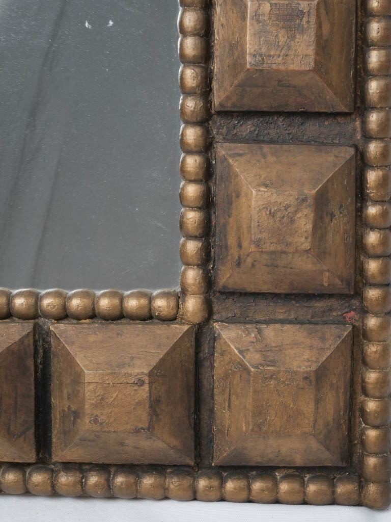 Regal, refined, parquet-style mirror
