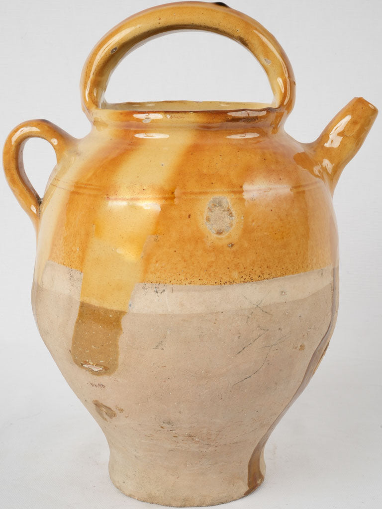 Antique yellow-glazed French water cruche