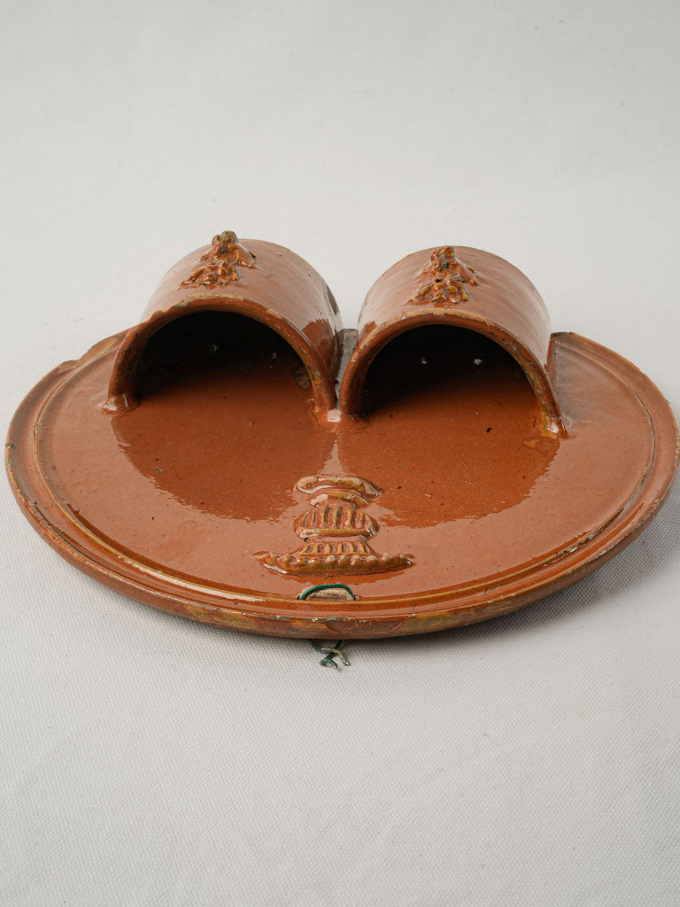 Historical decorative kitchen strainer