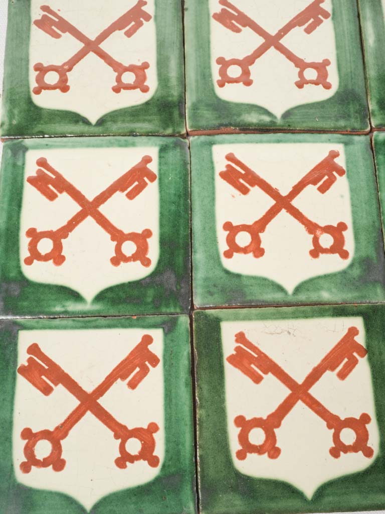 Medieval-style papacy emblem tiles