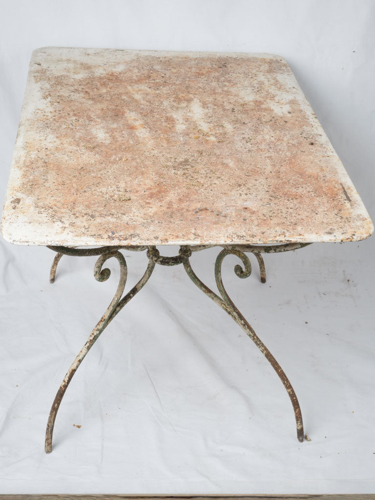 Aged white French garden table