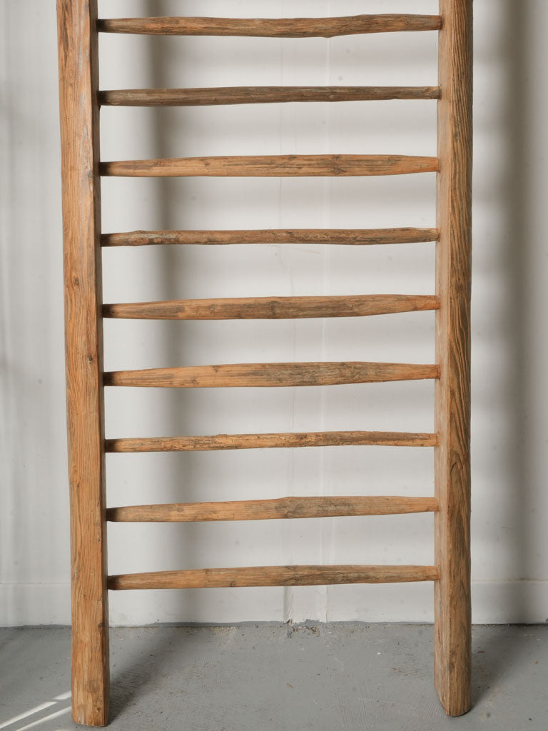 Antique honey-toned towel holder