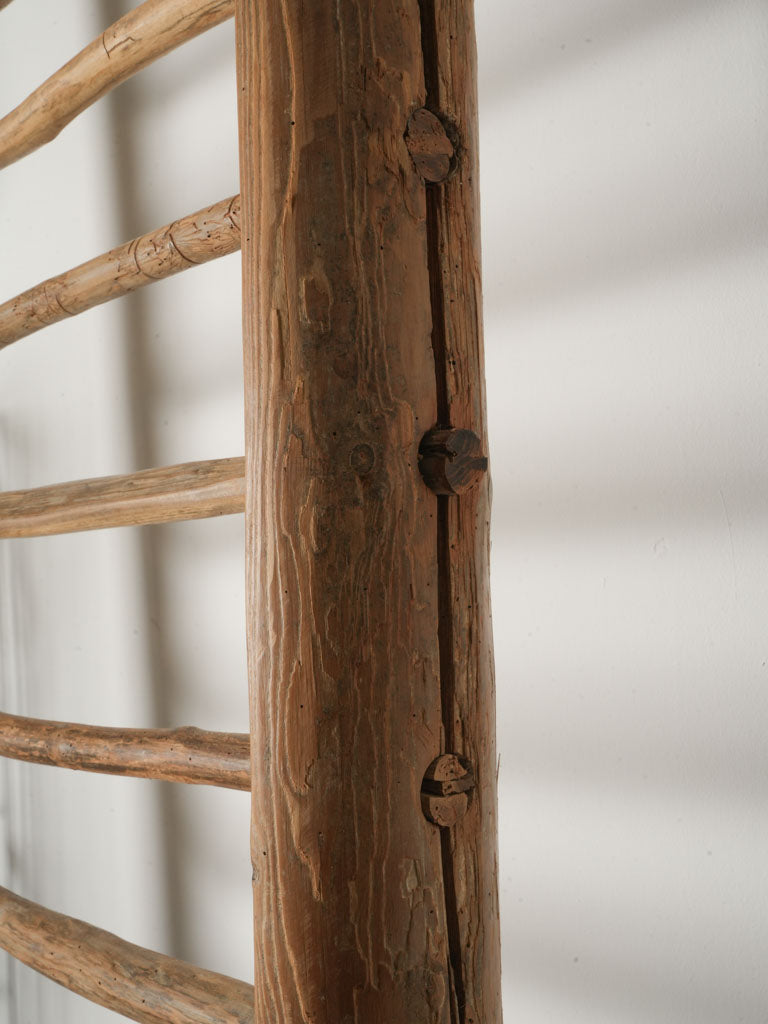 Sculptural rustic ladder-style holder