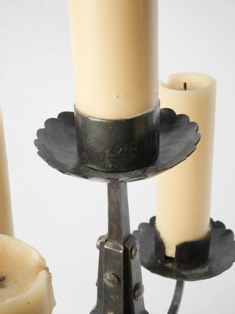 Patina-finished French iron candelabra