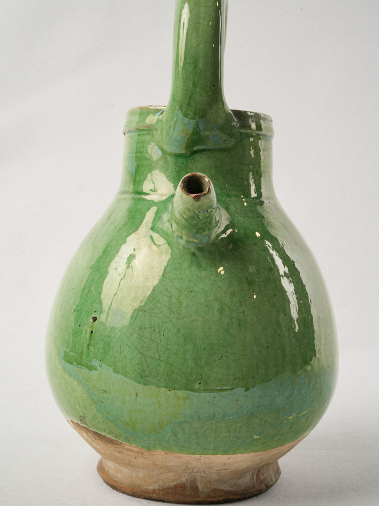 Gracefully arching handle jug