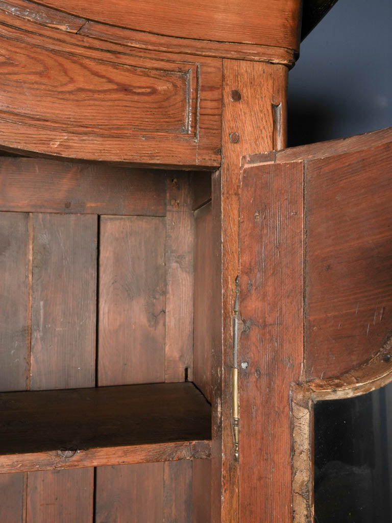 Serpentine molded door cabinet