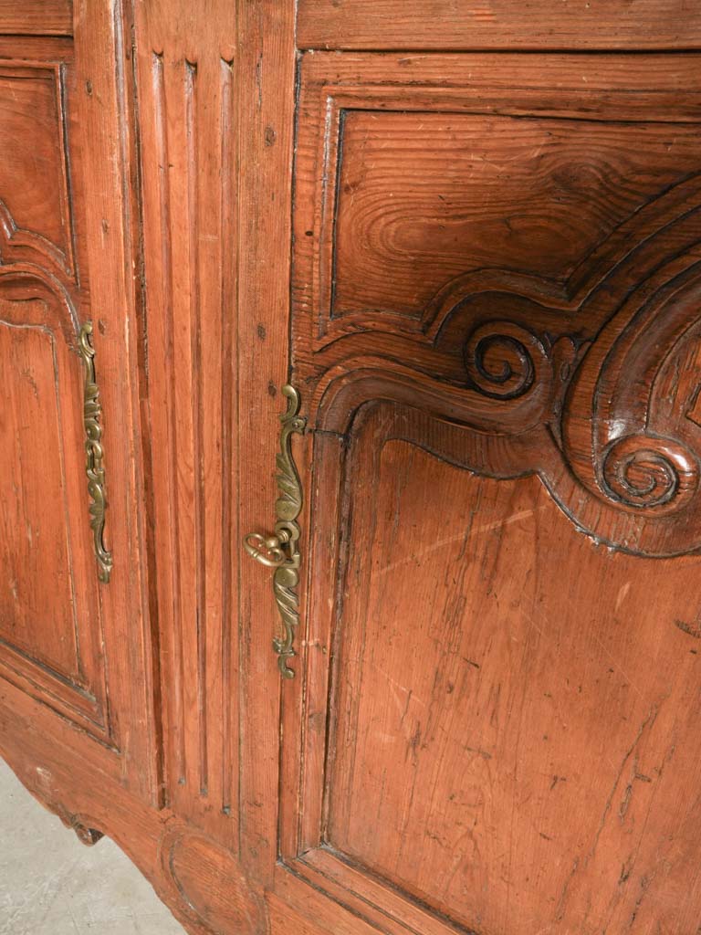 Hand-carved wood storage cupboard