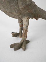 Textured vintage iron bird sculptures