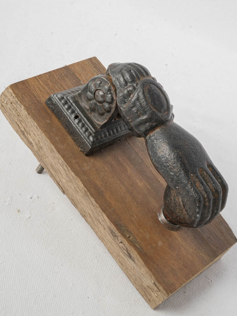 Whimsical antique cast-iron door knocker