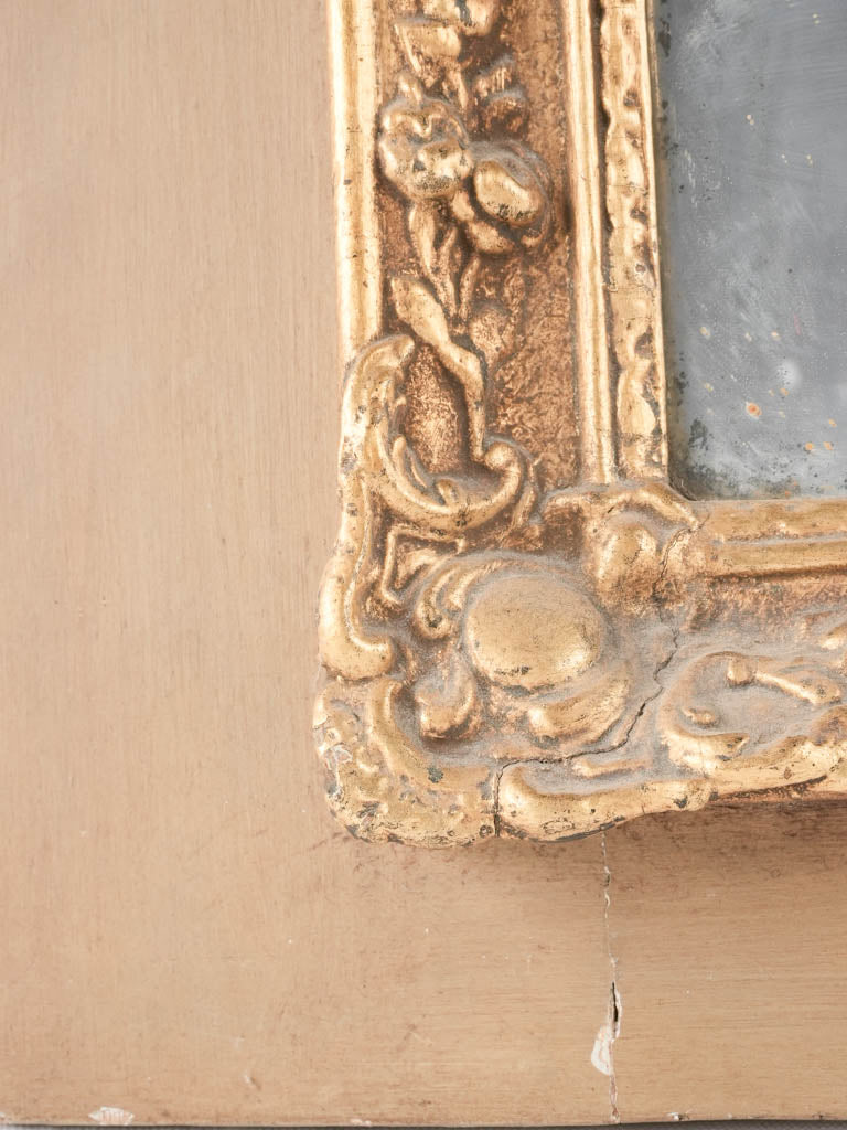 Classic ornate mirror with age marks