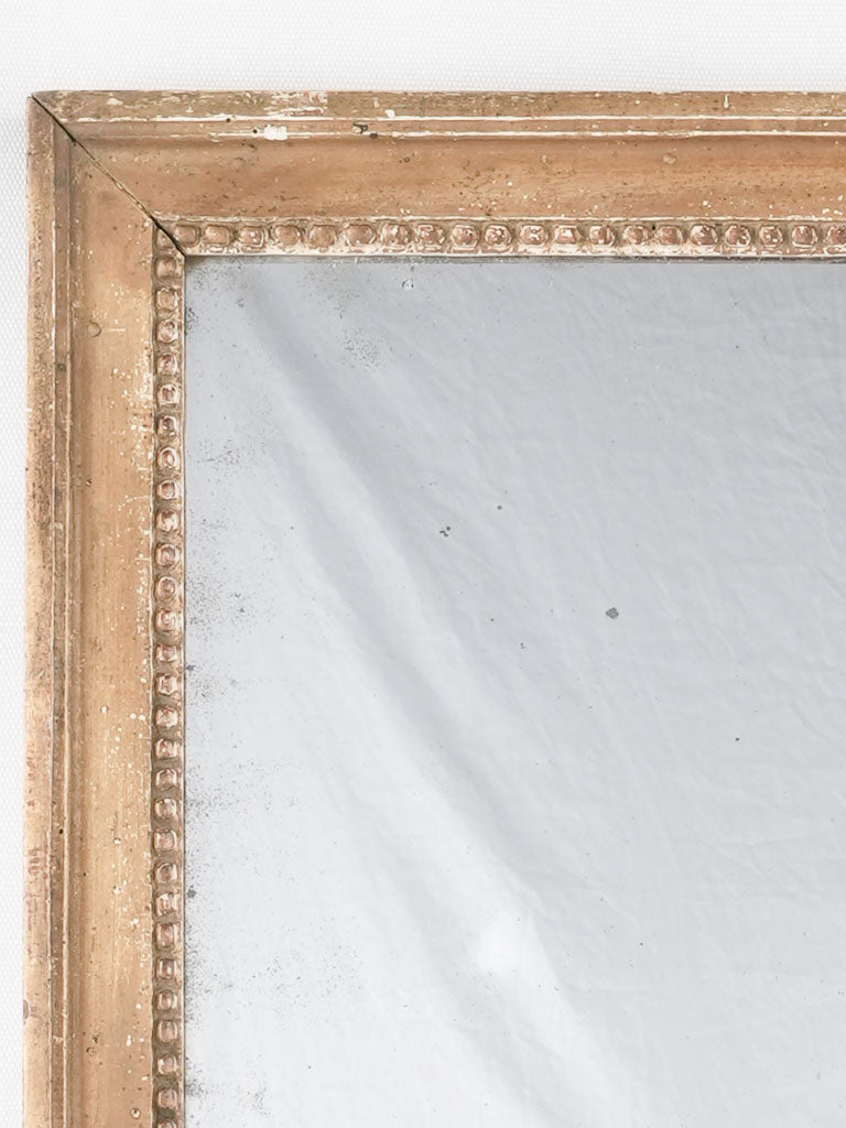 Antique bead-patterned decorative wall mirror
