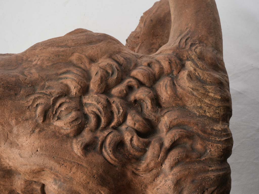 Warm-hued collectible bull sculpture