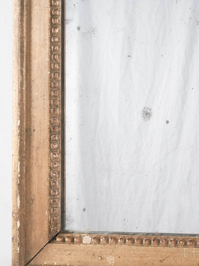 Historical beadwork detailed hallway mirror