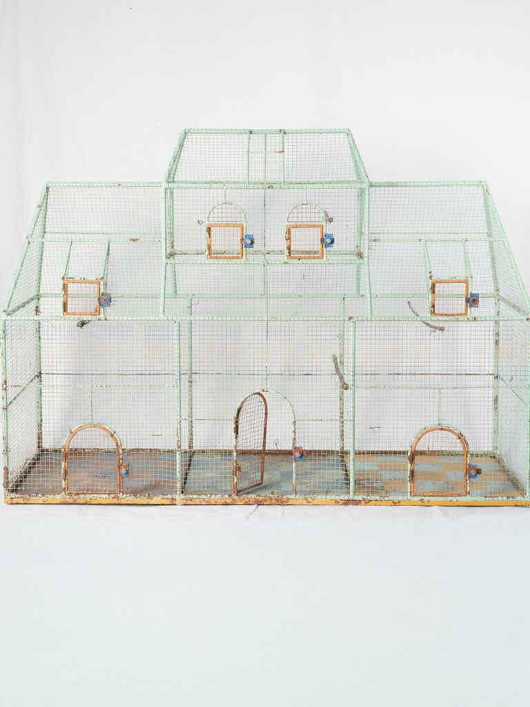 Timeworn multi-gabled birdhouse