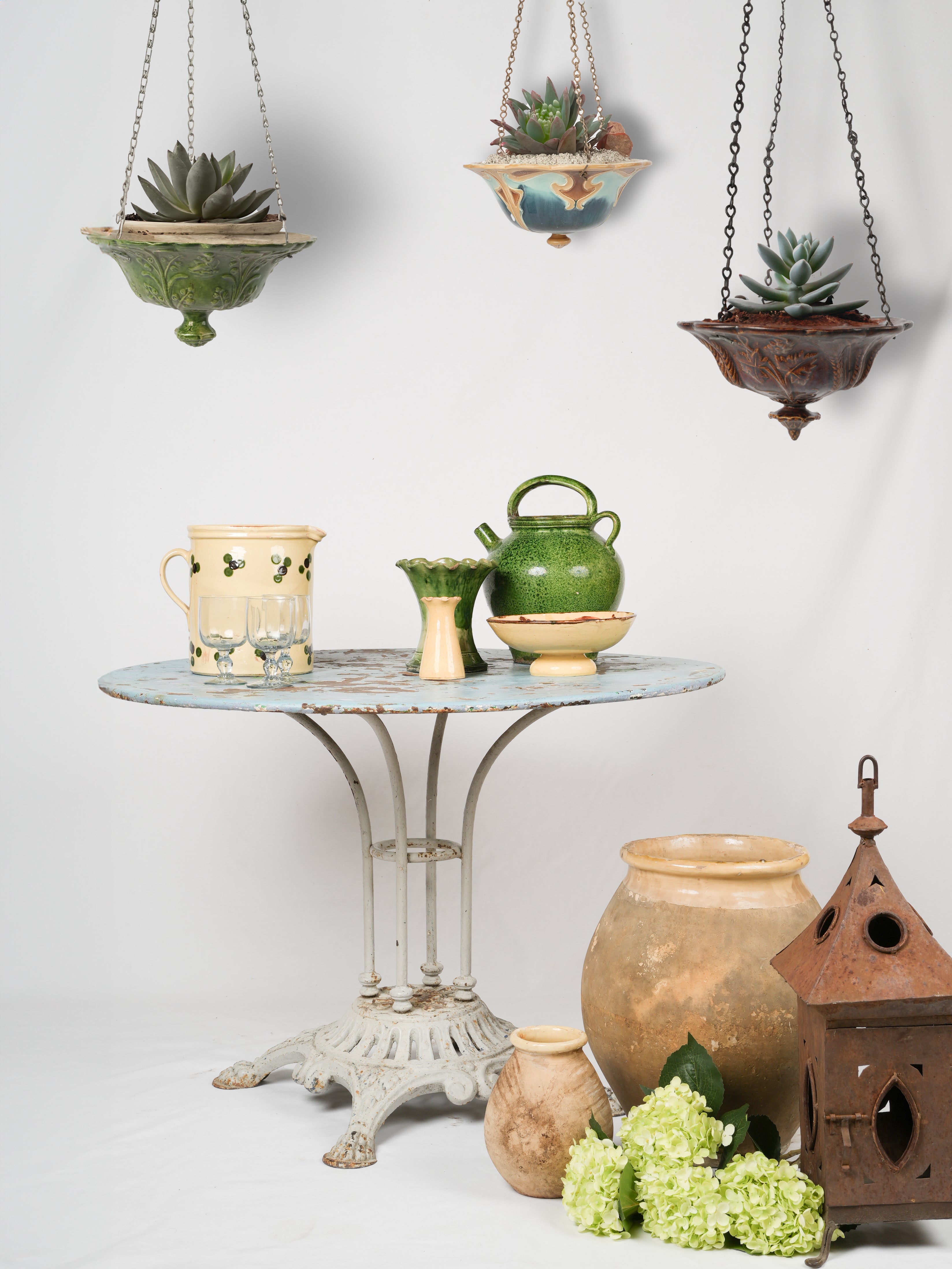 Time-worn French ceramic oil container