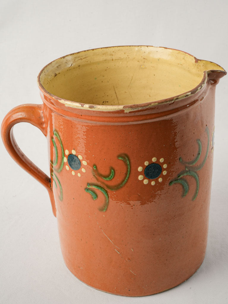 Textured antique ceramic French pitcher