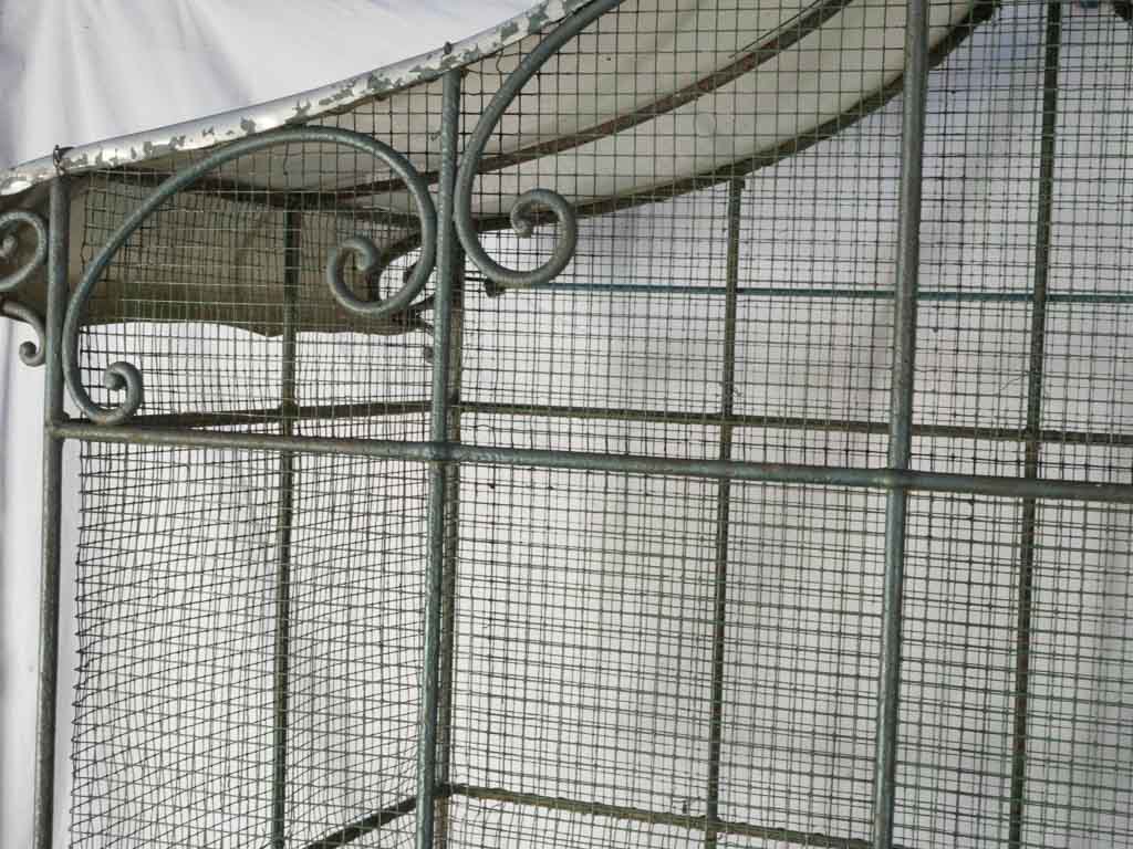 Lyrical scrollwork birdcage