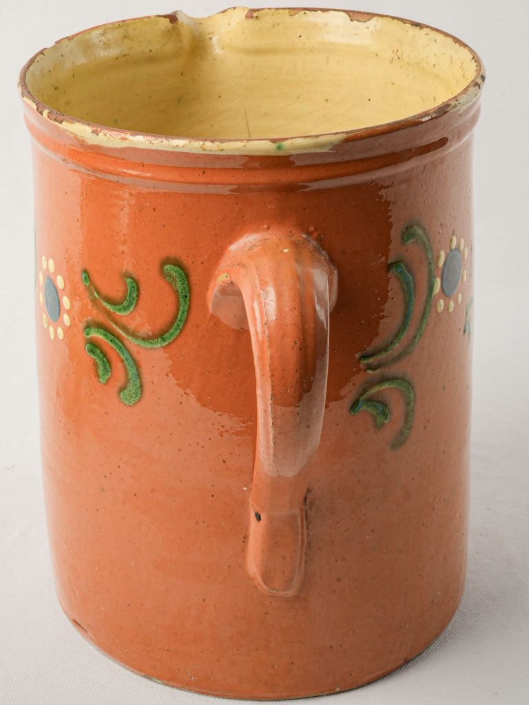 Bold red ocher pottery pitcher