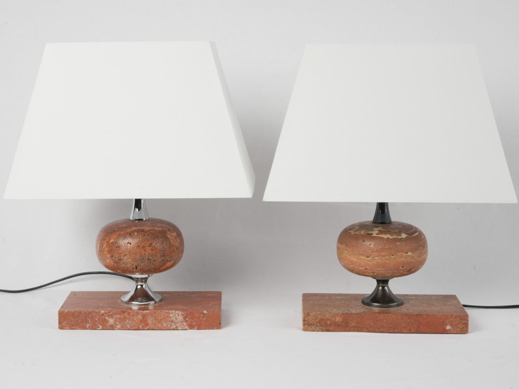 Modern chrome-accented travertine lamps