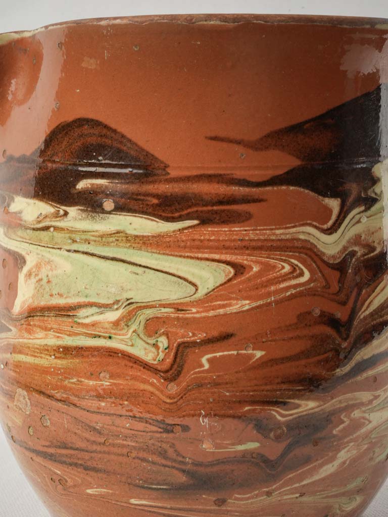 Distinctive streaked glaze pottery