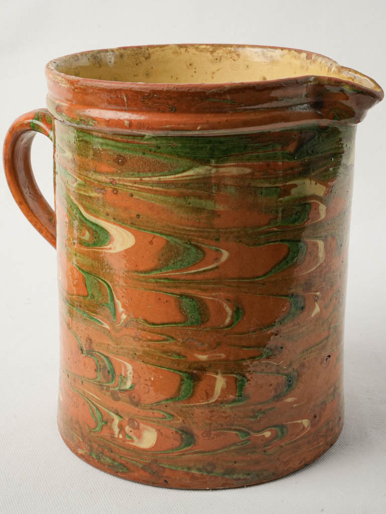 Glazed marbled ceramic jug
