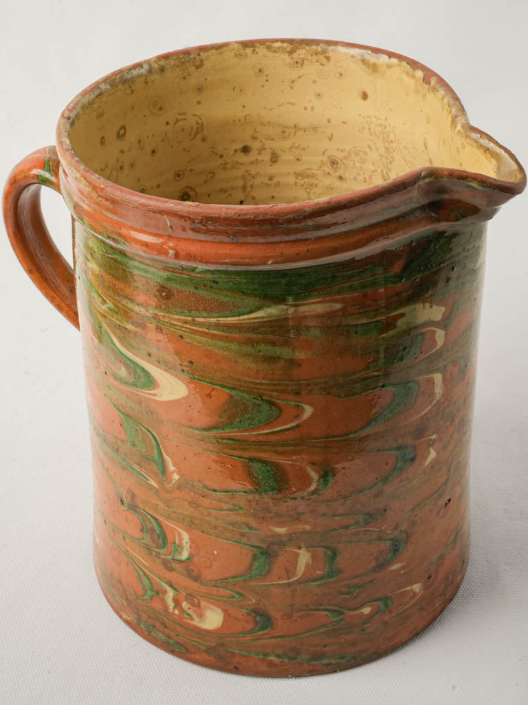 Rustic marbled terracotta pitcher