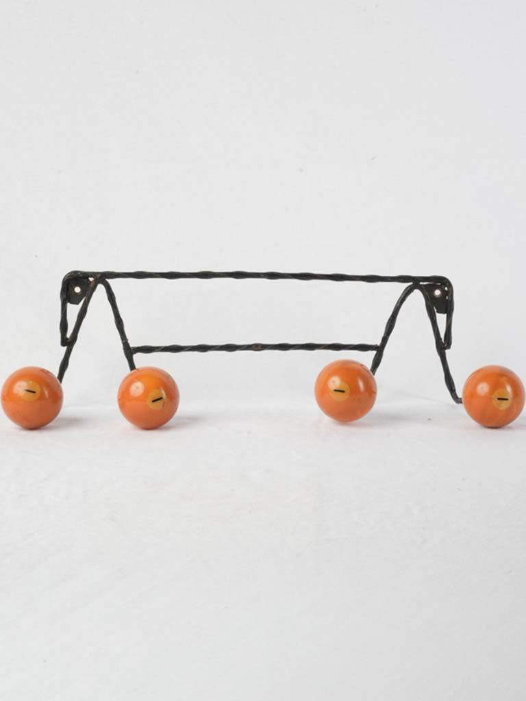 Sculptural wrought iron coat rack