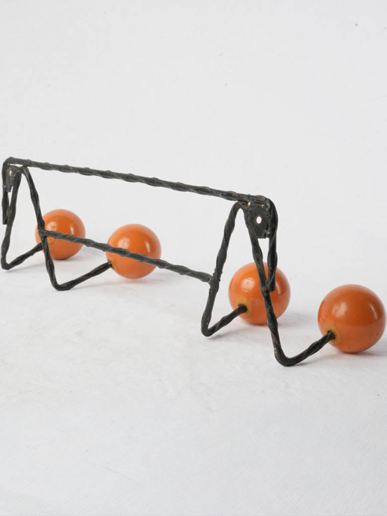 Glossy orange vintage hook fixture